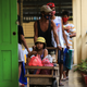 Residents carrying their belongings arrive at an evacuation center in Legaspi, Albay province, south of Manila on October 31, 2020, ahead of Typhoon Goni’s landfall.